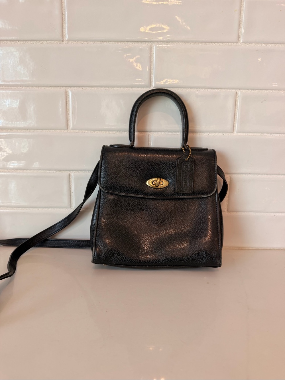 Coach vintage black leather top-handle bag